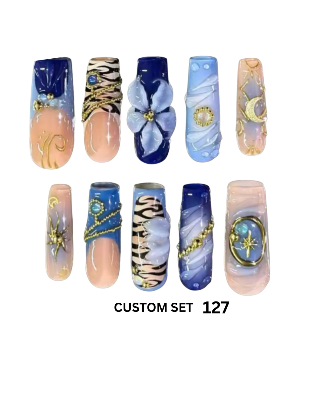 A set of 10 custom press-on nails.  The nails feature various designs including blue and peach gradients, floral details, gold chain accents, and celestial motifs like moons and stars.