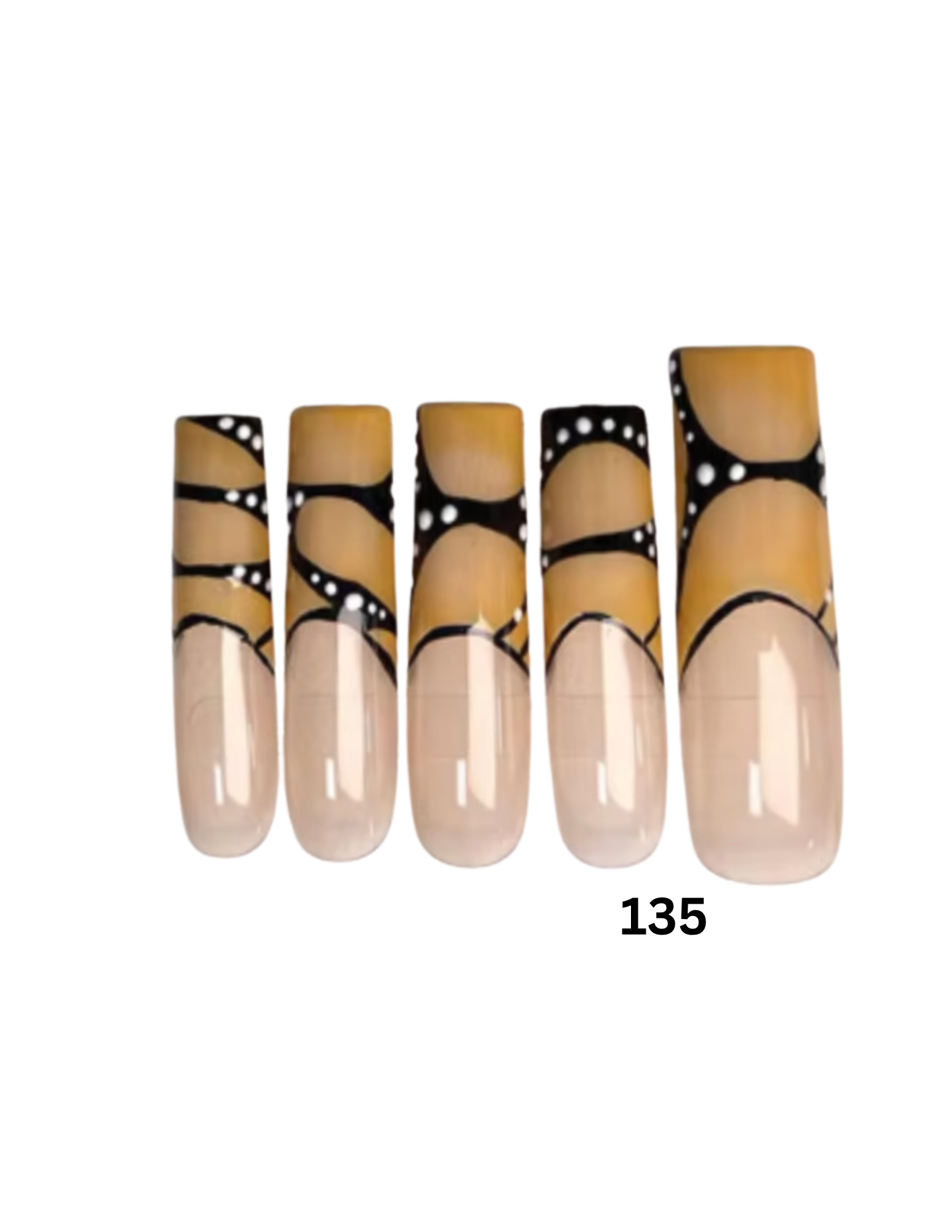 A set of five press-on nails with a glossy beige base and a black and white dotted pattern near the tips