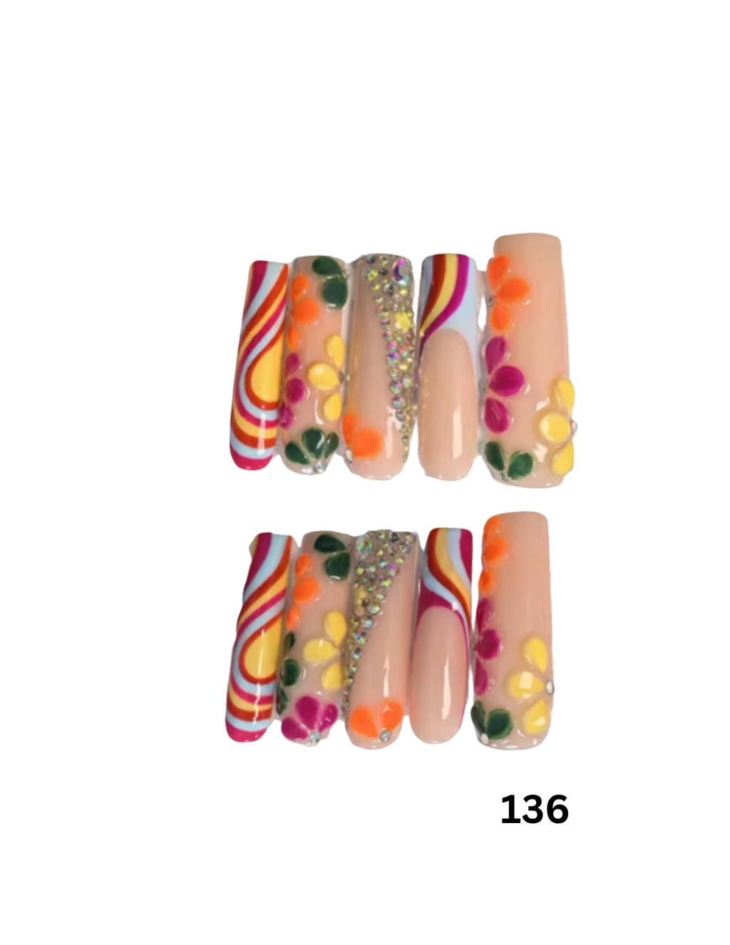 Press-on nails featuring various colorful designs including swirls, floral patterns, and rhinestone accents. 