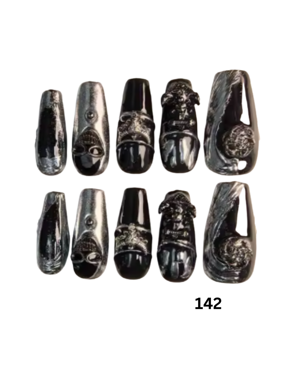 Coffin-shaped press-on nails. The nails are glossy black and silver with various gothic and fantasy designs including skulls, a lion, a snake, and a skull with a crescent moon.