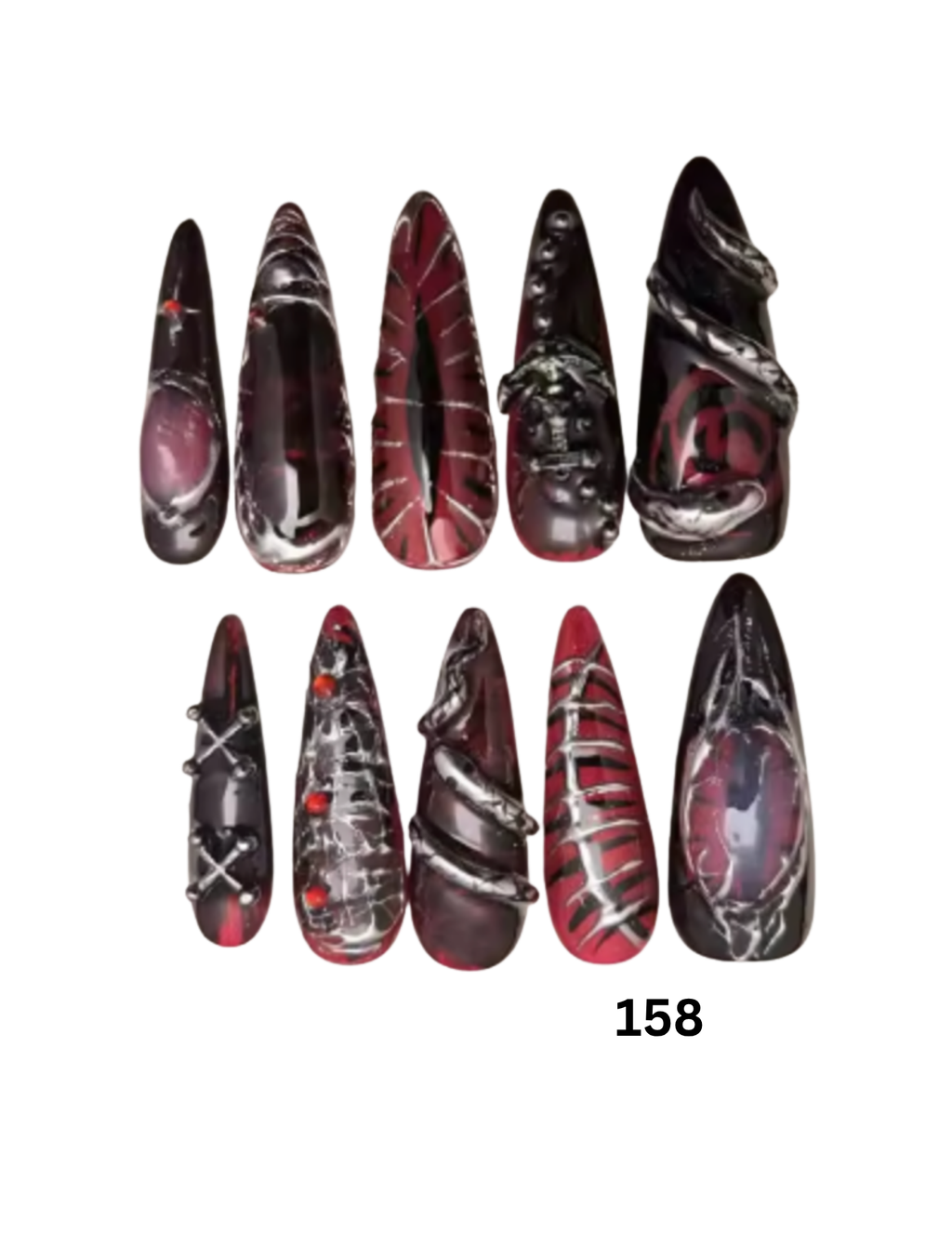 Ten coffin-shaped press-on nails with gothic designs in red, black, and silver, 