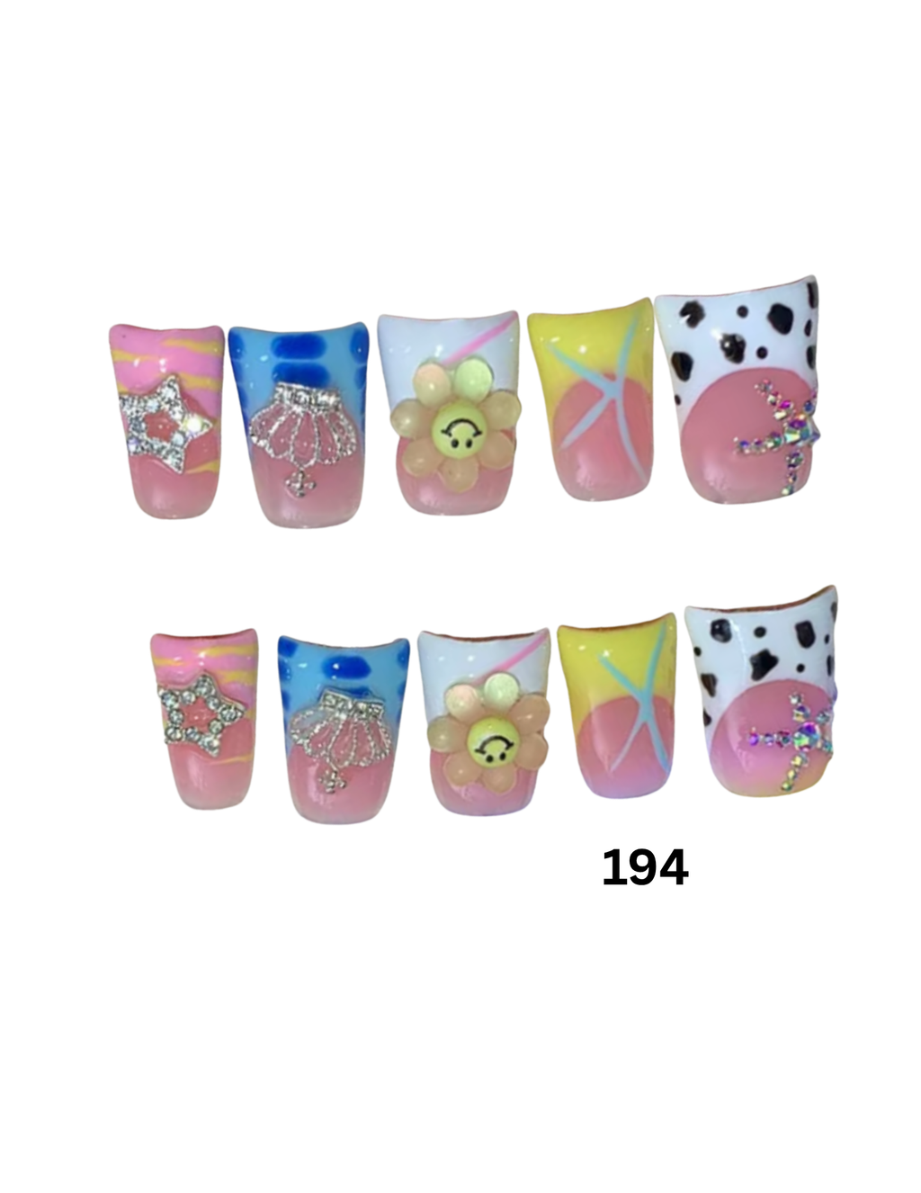 Ten decorative false fingernails  The nails feature pastel pink, blue, yellow, and white designs with glittery rhinestone star and shell motifs, a flower accent, and cow-print details.